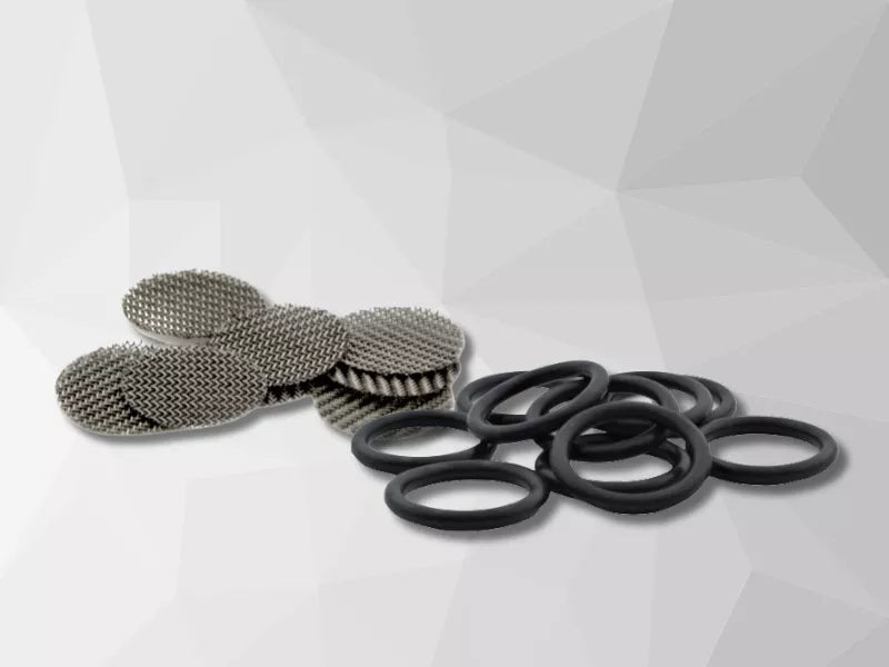 Photo of a grey geometrical background with filters and o-rings