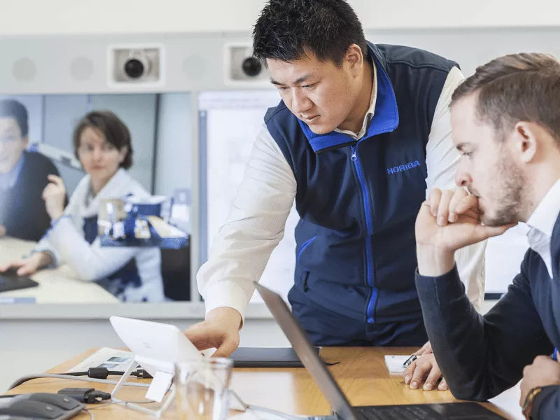 Photo of HORIBA trainers during a training with a customer